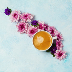 Fototapeta na wymiar Coffee cup and flowers