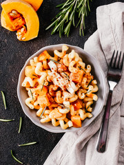 Fusilli pasta with pumpkin, rosemary and brie
