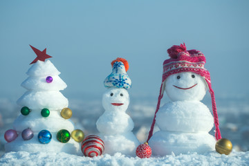 Snow sculptures on blue sky background