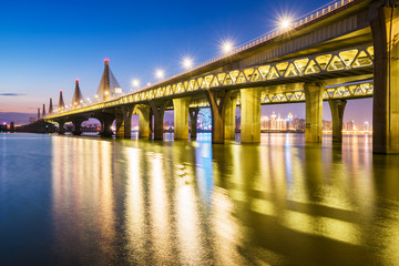 City of landmark buildings, modern bridge night view, China Nanchang