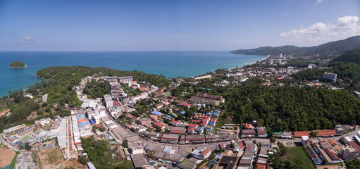 Naklejka premium Blue Sky Over Karon Town And Beach In Phuket, Thailand, Aerial Drone Panoramic Shot