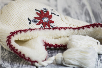 trendy hat on a wooden background