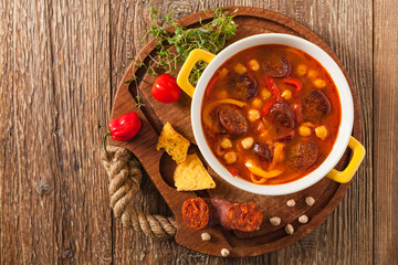Traditional chickpea soup with paprika and chorizo sausage.