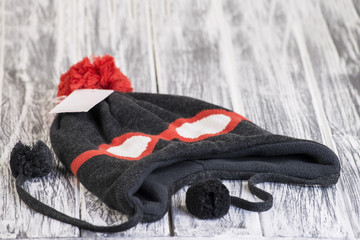 trendy hat on a wooden background
