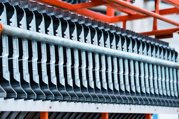 A car factory; neatly arranged exterior components of a car