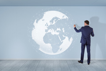 Businessman using digital planet earth interface on a wall 3D rendering