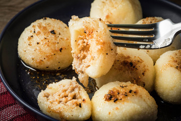 Potato dumplings with meat.