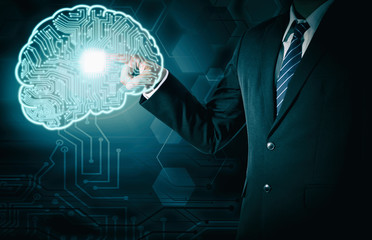 businessman with Artificial Intelligence brain connect to technology network concept 