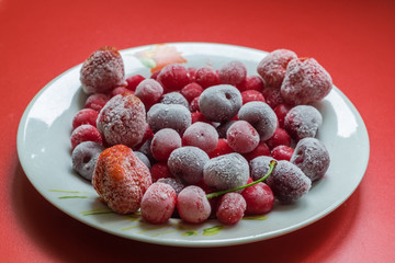 Frozen red berries cherry and strawberry
