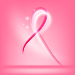 Glowing October breast cancer awareness month pink ribbon with sparkles on bright pink background