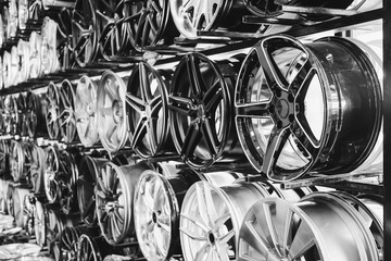 wall of alloy car wheels in store