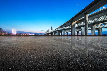 night scene of empty road near river in seoul