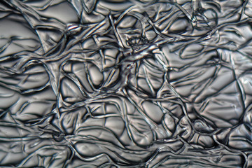 Fibers of Cellulose acetate under the microscope.