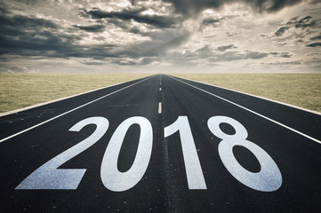 2018 Road perspective, dark clouds, crisis concept