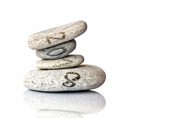 2018 written on stack of pebbles isolated on white background