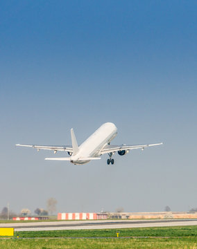 Fototapeta Airplane is taking off at airport.