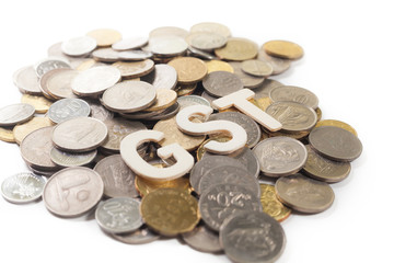 The word GST (Goods and services tax) with coins isolated white  background