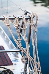 Obraz premium Ropes tied a noose hanging on the fence yacht