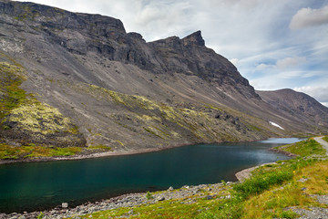 Mountain lake with clear water. Kola Peninsula , Khibiny . Russia.