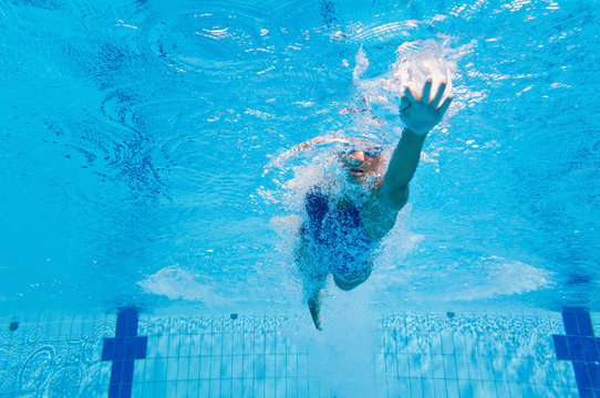 Female swimmer from beneath