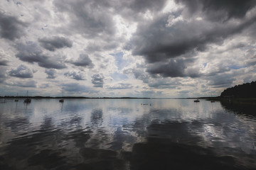 Clouds reflected in Miedwie Lake in Morzyczyn town near Stargard in Poland