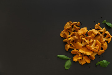 chanterelles mushrooms on black table