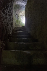 Hidden passage excavated in the rock