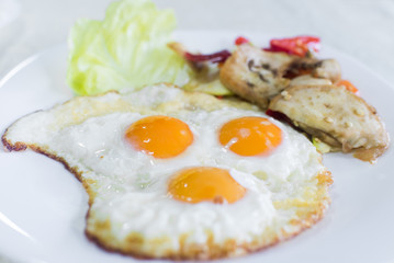 Fried eggs served in a plate