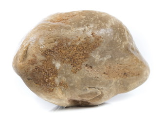 Single natural stone on white background, close-up