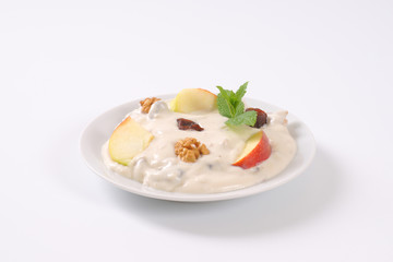 cream cheese with apples, nuts and raisins