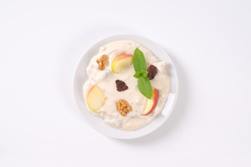 cream cheese with apples, nuts and raisins