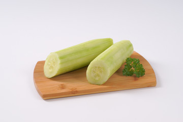 halved peeled cucumber