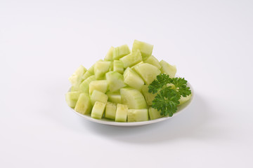 plate of sliced cucumber