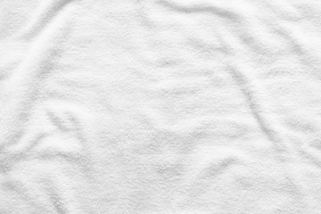 White towel texture for background. That fabric or textile consist of cotton fiber material. Look plush, fluffy, dry, soft and clean. For background about baby, spa, hotel, laundry and hygiene etc.