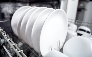 Obraz na płótnie Canvas Clean dishes in dishwasher machine after washing