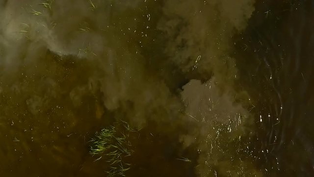 Dirty polluted water from above - slow motion