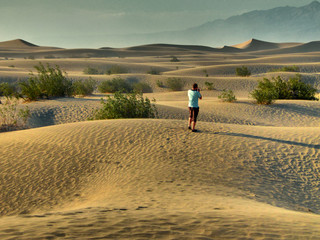 A man take a Photo on the Death Valley desert