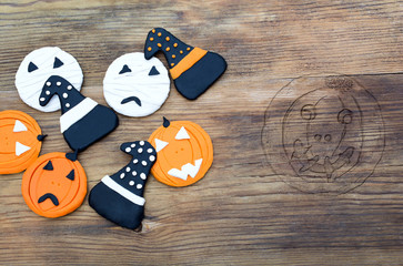 Funny cookies made with various shapes and carved pumpkin