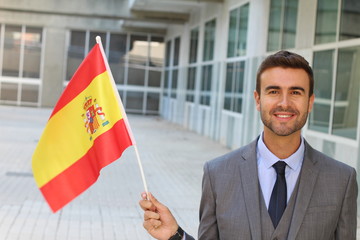 Proud man waving the Spanish flag