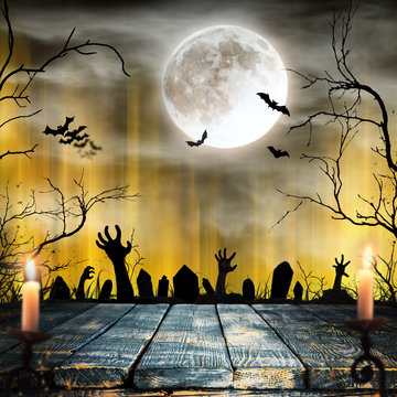 Spooky Halloween background with zombie hands.