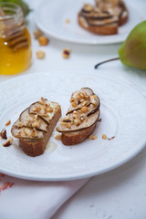 Bruschetta with pear and cottage cheese