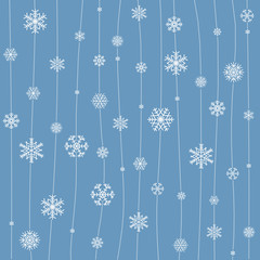 Christmas seamless pattern from snowflakes on blue background.