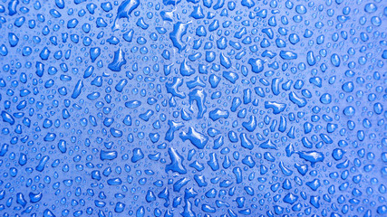 Droplet water on a blue background.