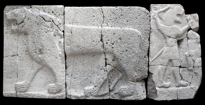 Ancient stone bas-relief with lion 