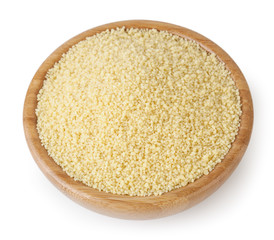 Uncooked couscous in wooden bowl isolated on white background with clipping path