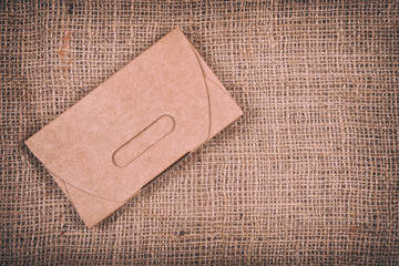 paper envelope on fabric background