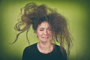 angry woman with a strange hair style