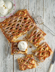 Fresh homemade pie with apples and ice cream
