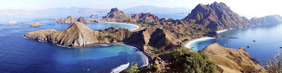 High Panoramic scenic view of Padar Island with  three beautiful bays and sandy beaches surrounded by a wide ocean and part of komodo national park in Flores, Indonesia