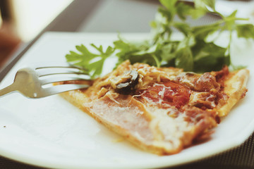 Delicious pizza on table in cafe